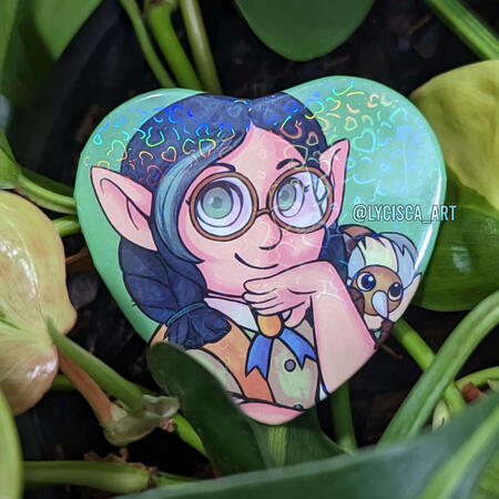 The Owl House inspired button, showing off holographic pattern